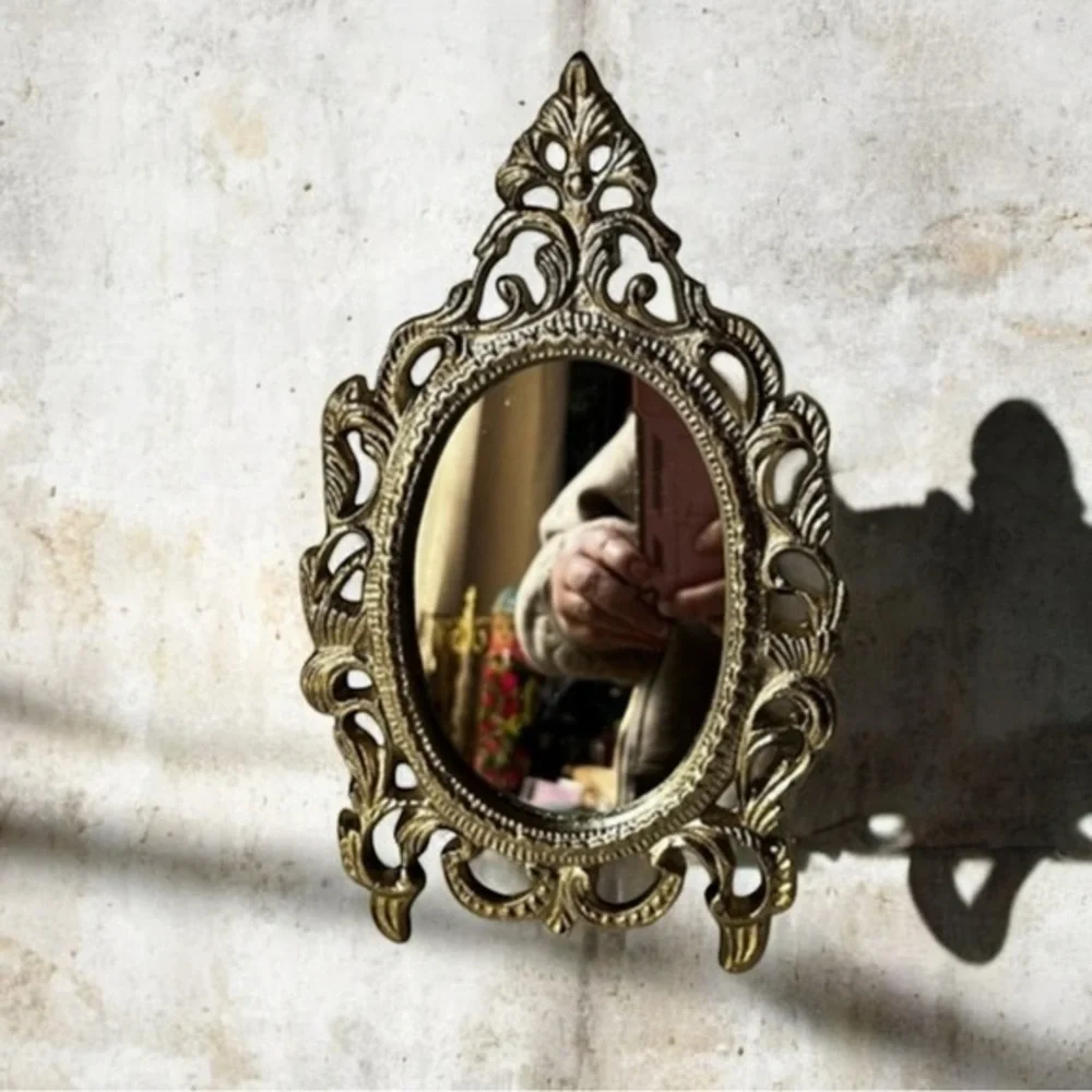 Ornate Vanity Mirror Oval metal Frame Scrollwork Tabletop Stand..